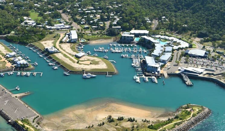 Aerial view of Nelly Bay harbour and the surrounding residential area on Magnetic Island
